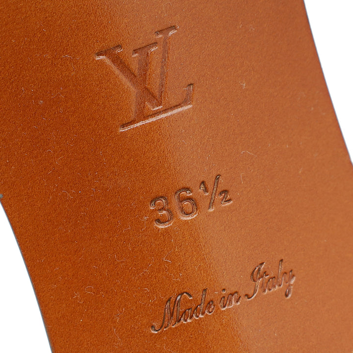 Louis Vuitton Natural Python Lock It Mules 36.5