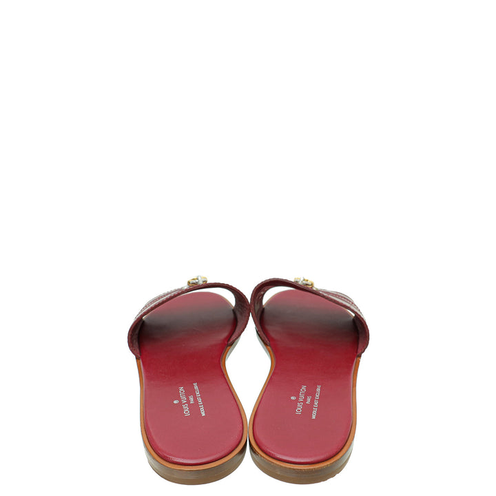 Louis Vuitton Burgundy Crocodile Lock It Flat Mules 37