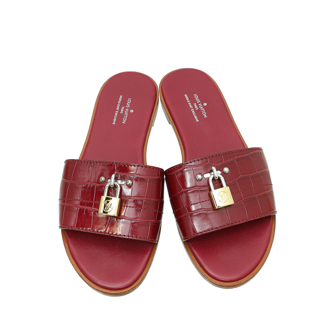 Louis Vuitton Burgundy Crocodile Lock It Flat Mules 37
