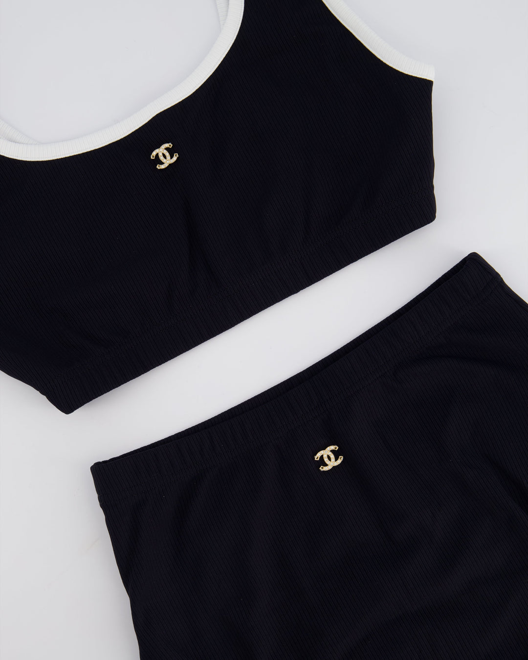 Top Quality Chanel 22S Black Two Piece Swim Suit Set with White Trim and Crystal CC Logo Detail Size Top FR 36 (UK 8) Bottoms FR 34 (UK 6)