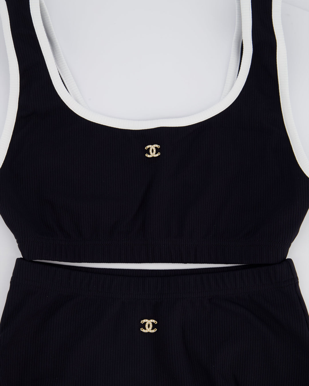 Top Quality Chanel 22S Black Two Piece Swim Suit Set with White Trim and Crystal CC Logo Detail Size Top FR 36 (UK 8) Bottoms FR 34 (UK 6)