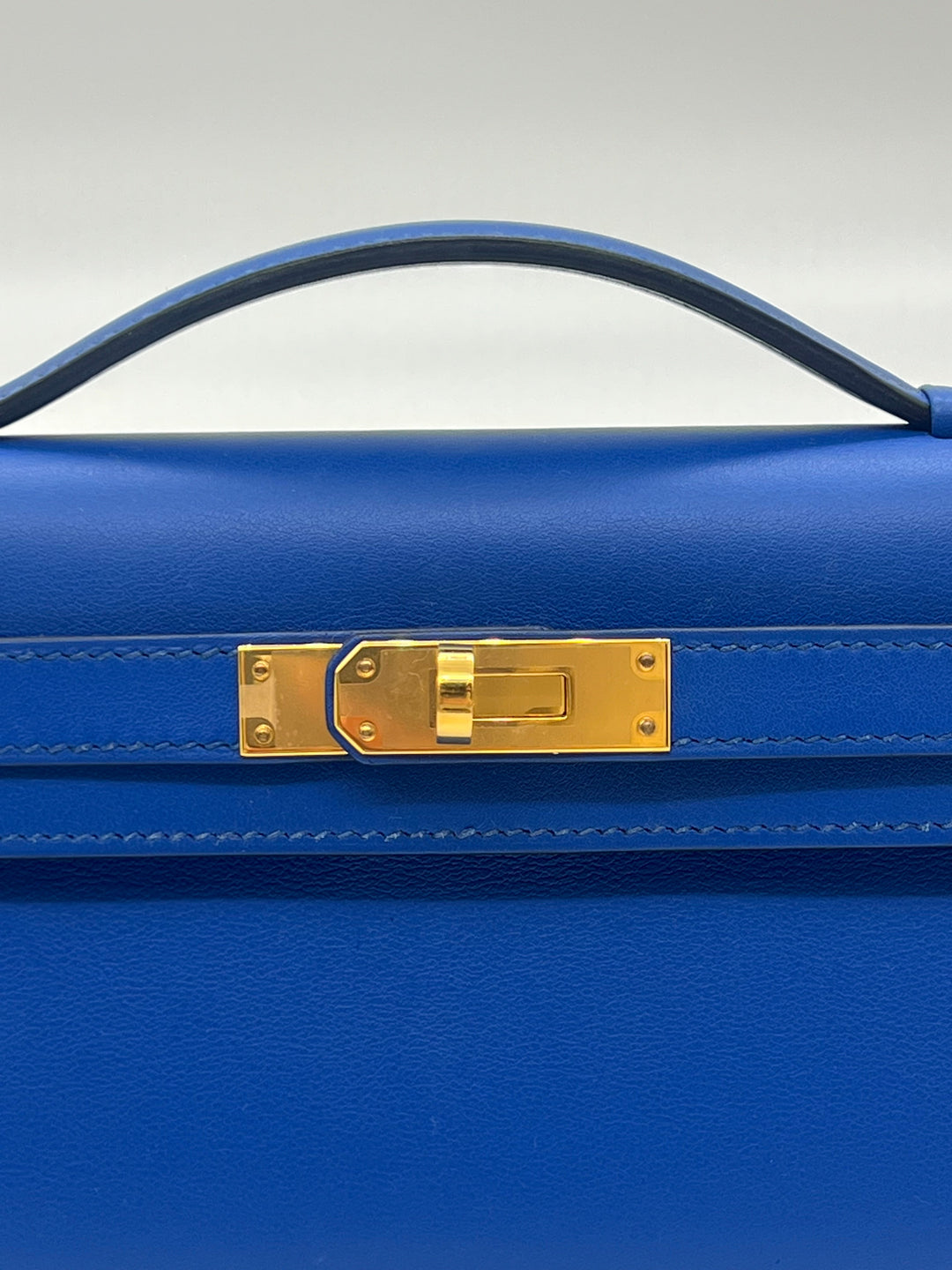 Top quality Hermes Kelly Cut Clutch Swift Calfskin Bleu France Gold Hardware