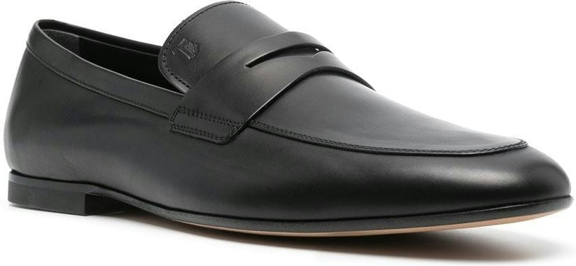 BLACK LEATHER TOD'S SLIP ONS.