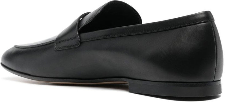 BLACK LEATHER TOD'S SLIP ONS.
