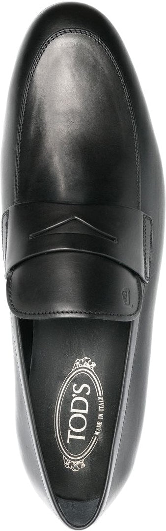 BLACK LEATHER TOD'S SLIP ONS.