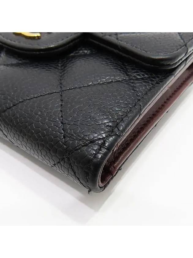 A82288 Black caviar skin gold COCO logo quilted classic small flap bi fold wallet Chanel