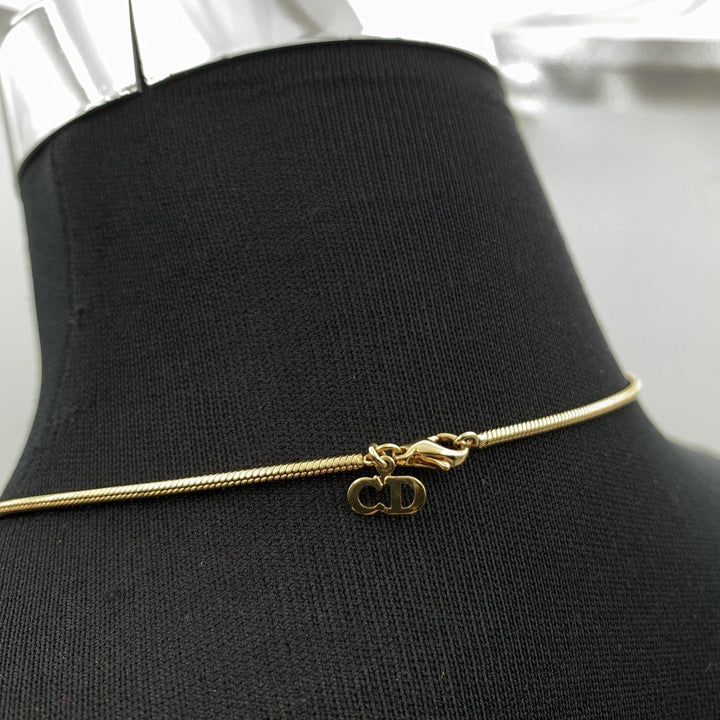 CHRISTIAN Dior Gold Metal Dangling Charms Logo Necklace
