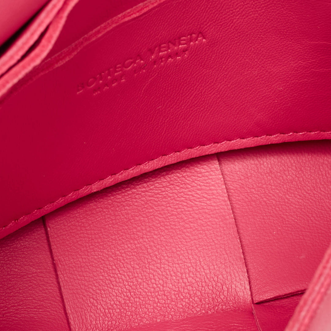Bottega veneta Fuchsia Intreccio Leather Mini Cassette Crossbody Bag