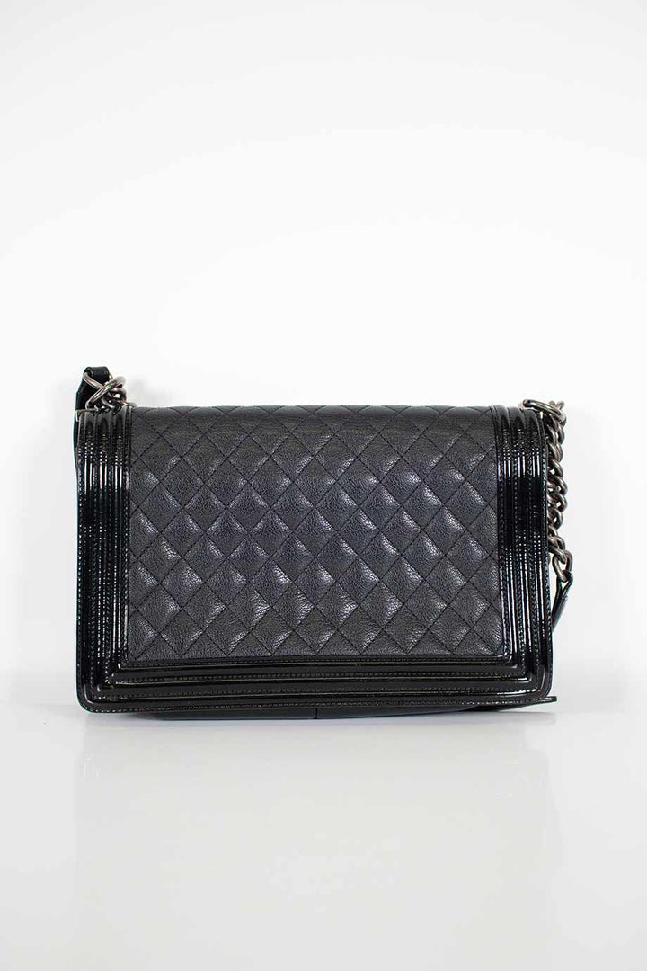 Chanel Black grained calfskin quilted 'Boy' bag with ruthenium-finish hardware and patent border in 'New Medium' size