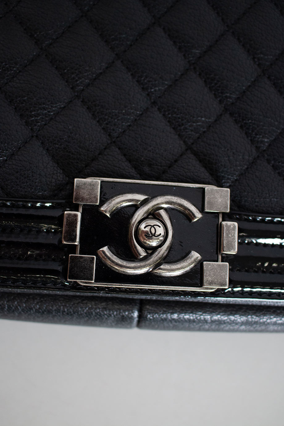 Chanel Black grained calfskin quilted 'Boy' bag with ruthenium-finish hardware and patent border in 'New Medium' size