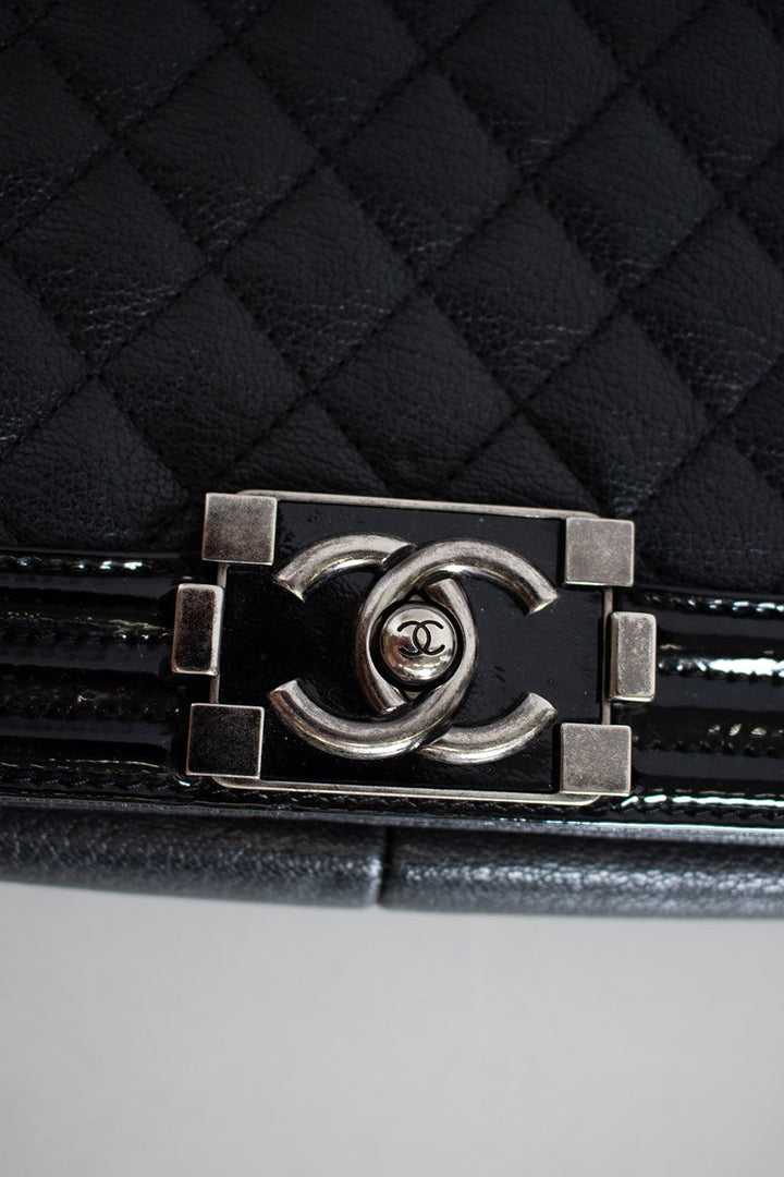 Chanel Black grained calfskin quilted 'Boy' bag with ruthenium-finish hardware and patent border in 'New Medium' size