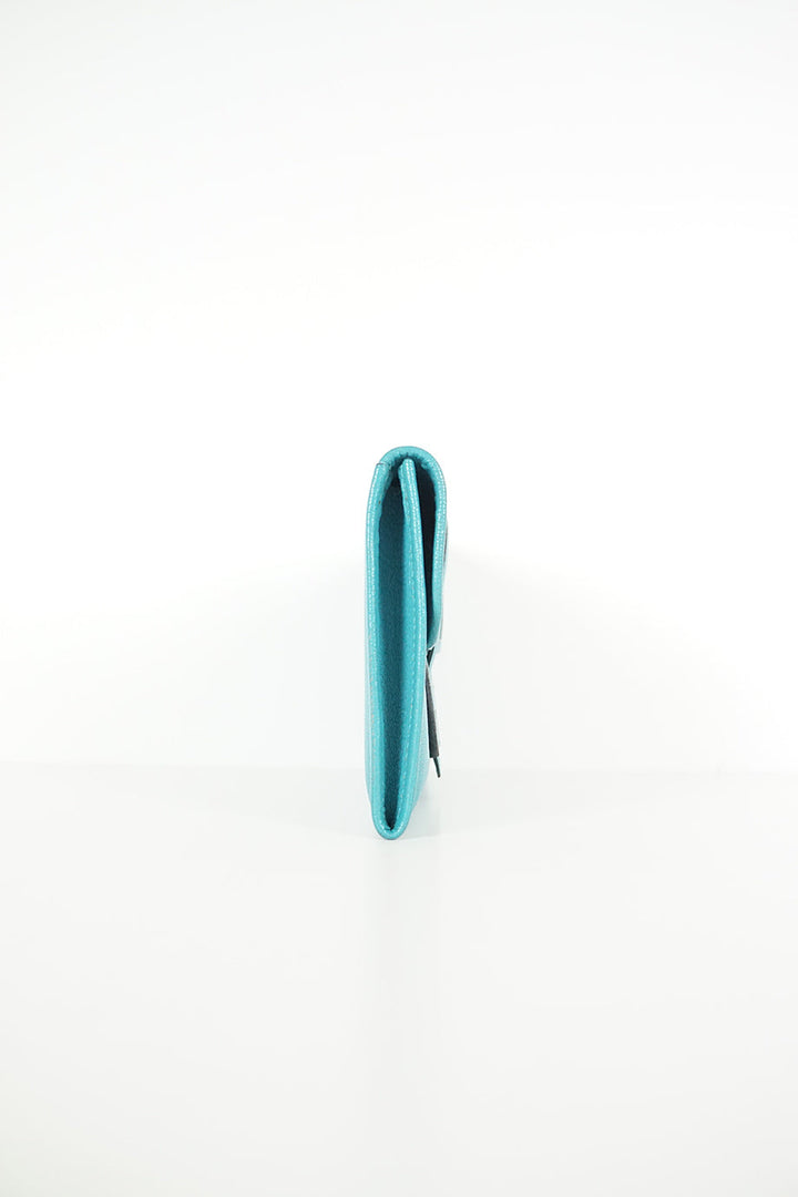 HERMeS turquoise jige leather clutch
