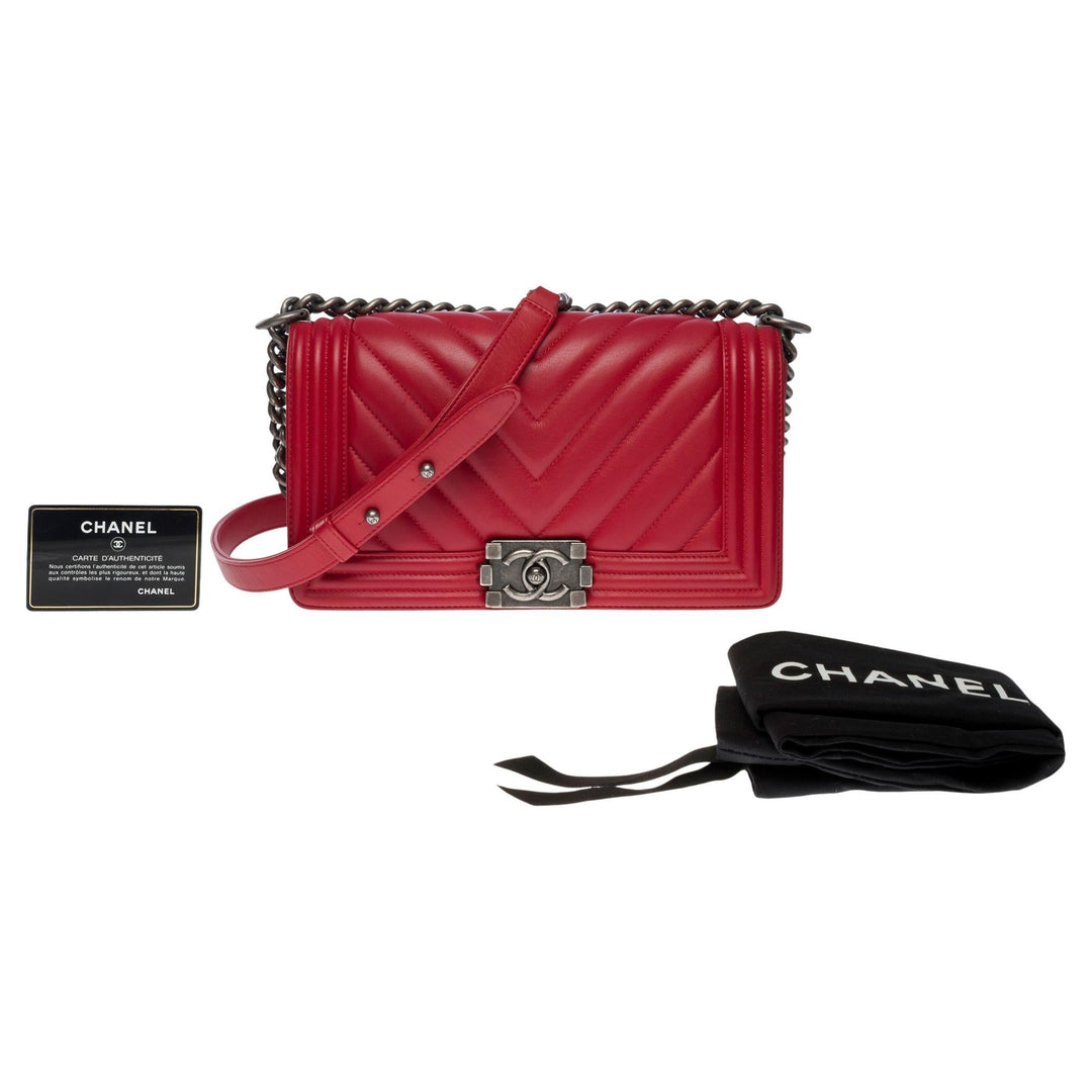 Chanel Boy Old Medium shoulder bag in red quilted herringbone leather, SHW