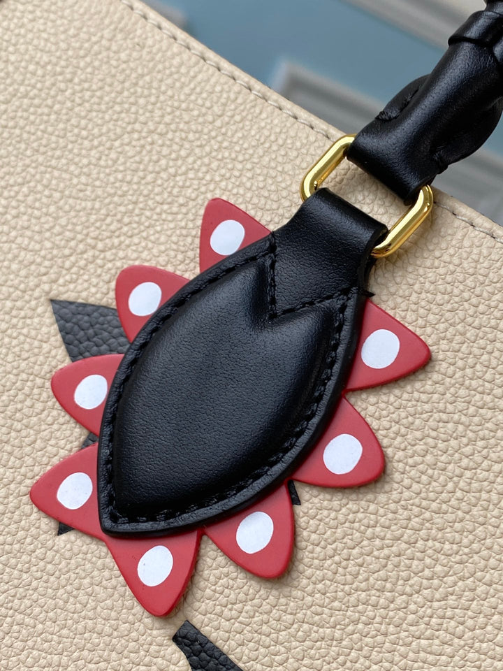 Louis Vuitton Crafty OnTheGo GM Bag