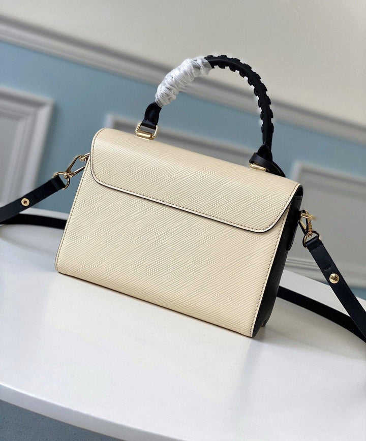 Louis Vuitton Crafty Twist MM Bag