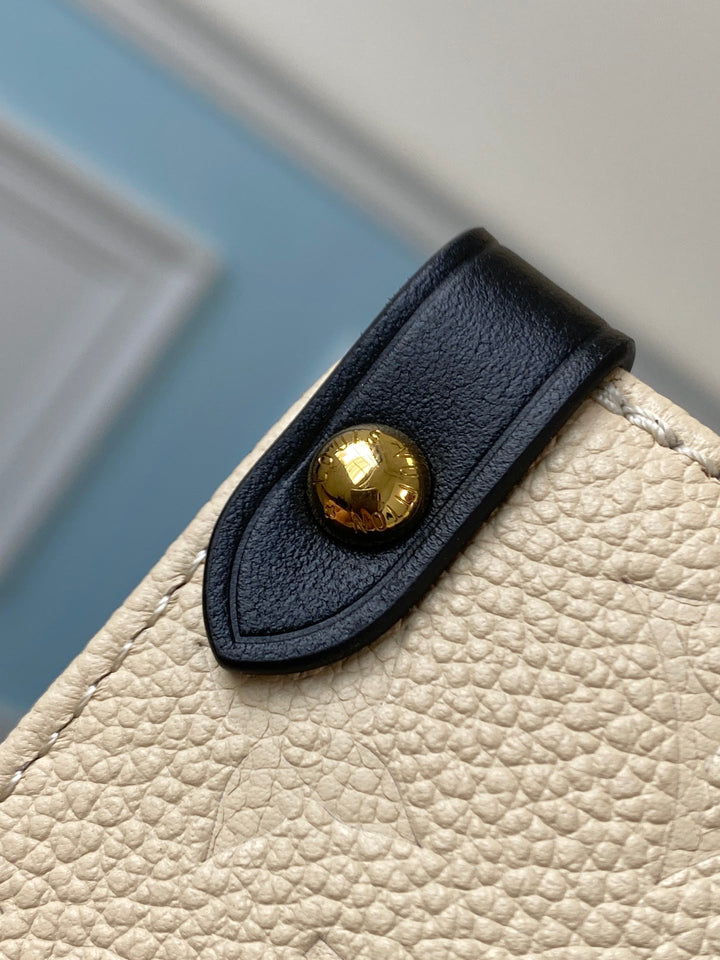 Louis Vuitton Crafty OnTheGo GM Bag