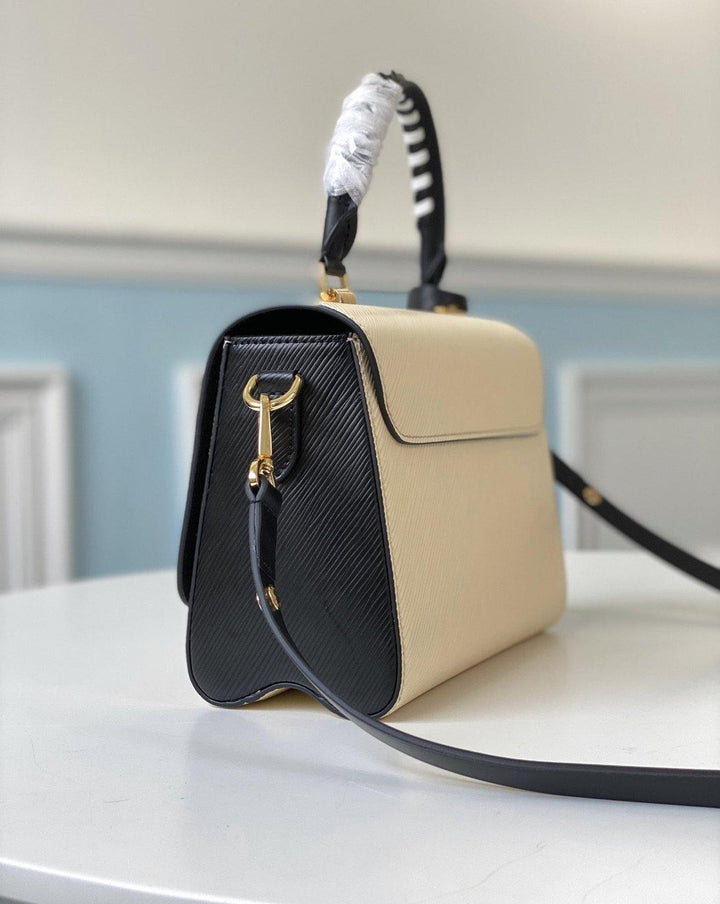 Louis Vuitton Crafty Twist MM Bag