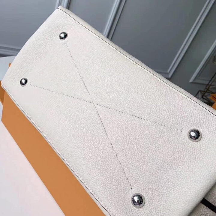 Louis Vuitton Carmel Bag