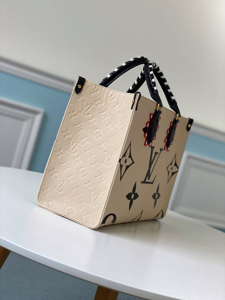 Louis Vuitton Crafty OnTheGo GM Bag
