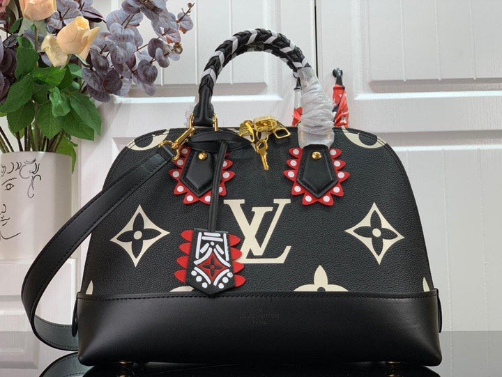 Louis Vuitton Crafty Alma PM Bag