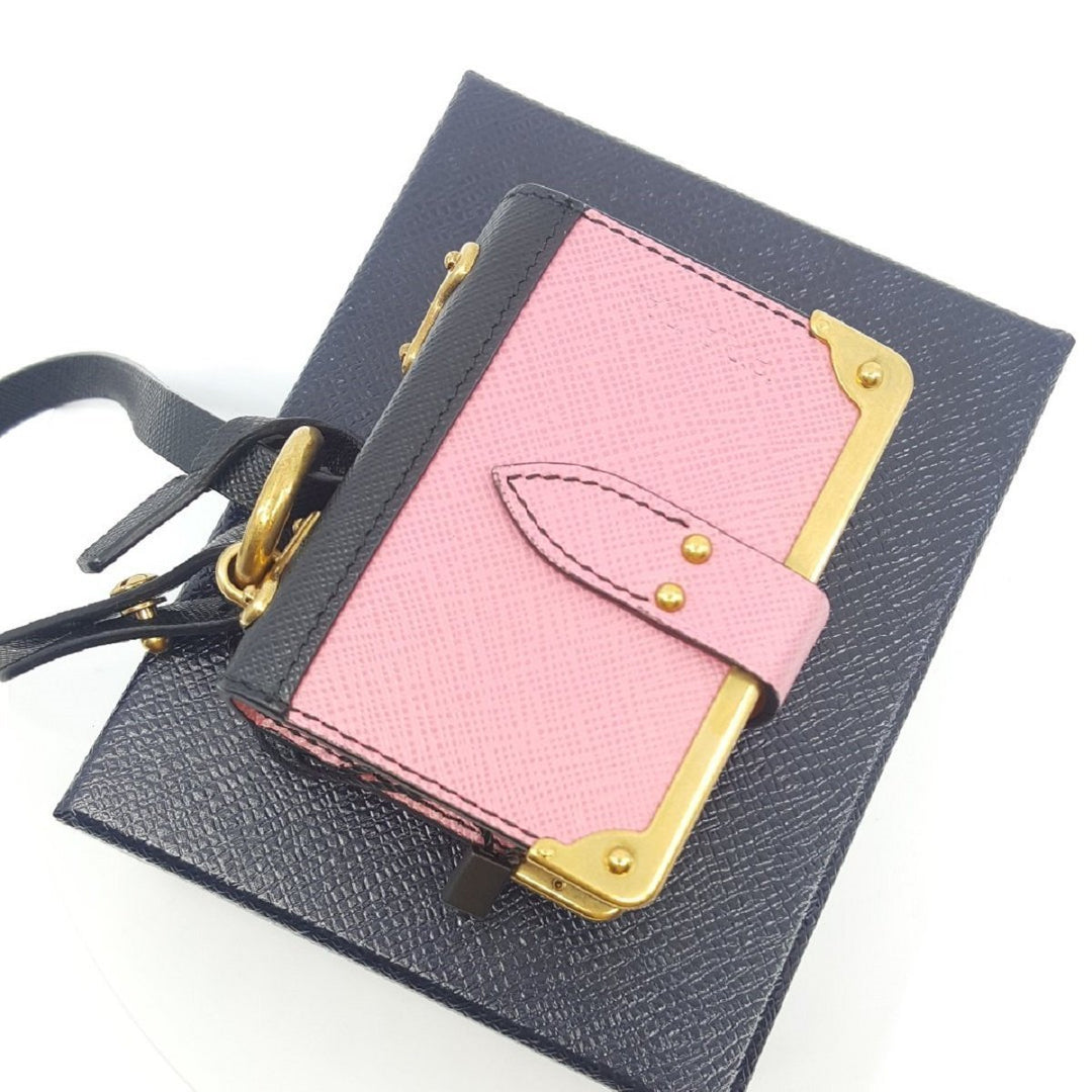 Prada Trick in Pelle Pink Black Gold-tone Hardware Keychain Journal Saffiano Leather 1TL058